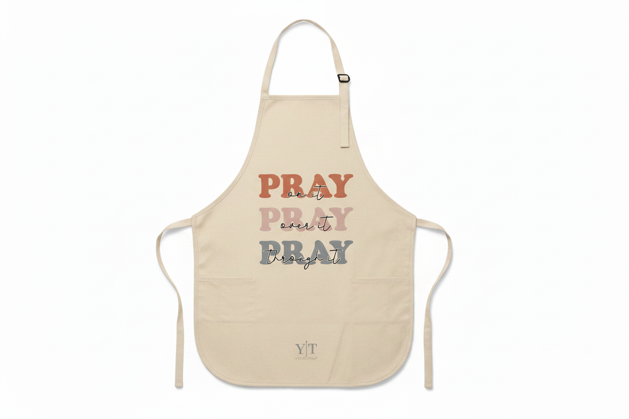 Pray On It Over It Through It cream apron - AI generated product image