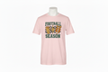 Light Pink Football Season Tee on Mannequin